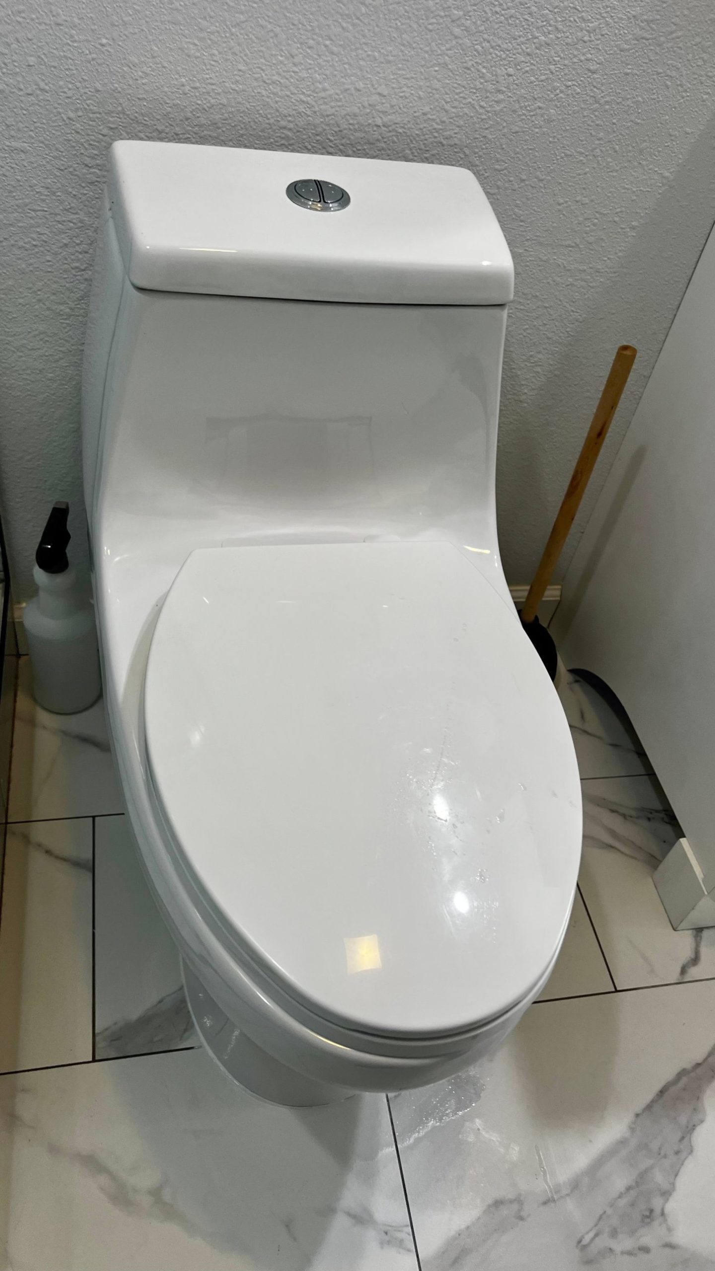 one-piece-dual-flush-toilet-installation